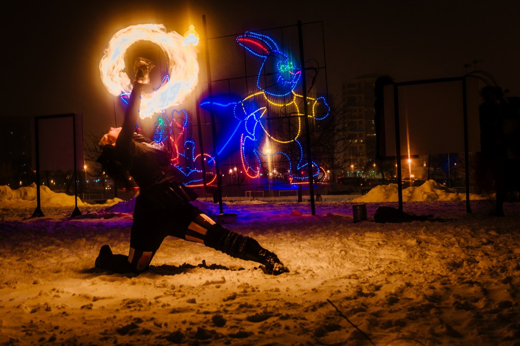 Lucy Loop fire poi dancing in Barrie's Winterfest 2015