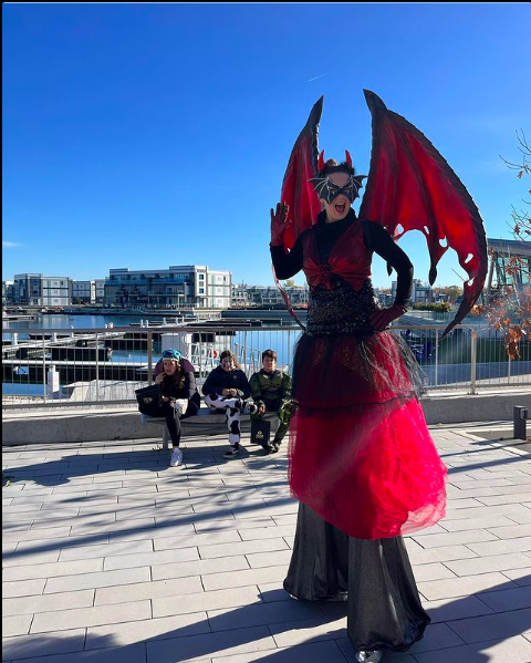 Bat queen on stilts from Hoop You